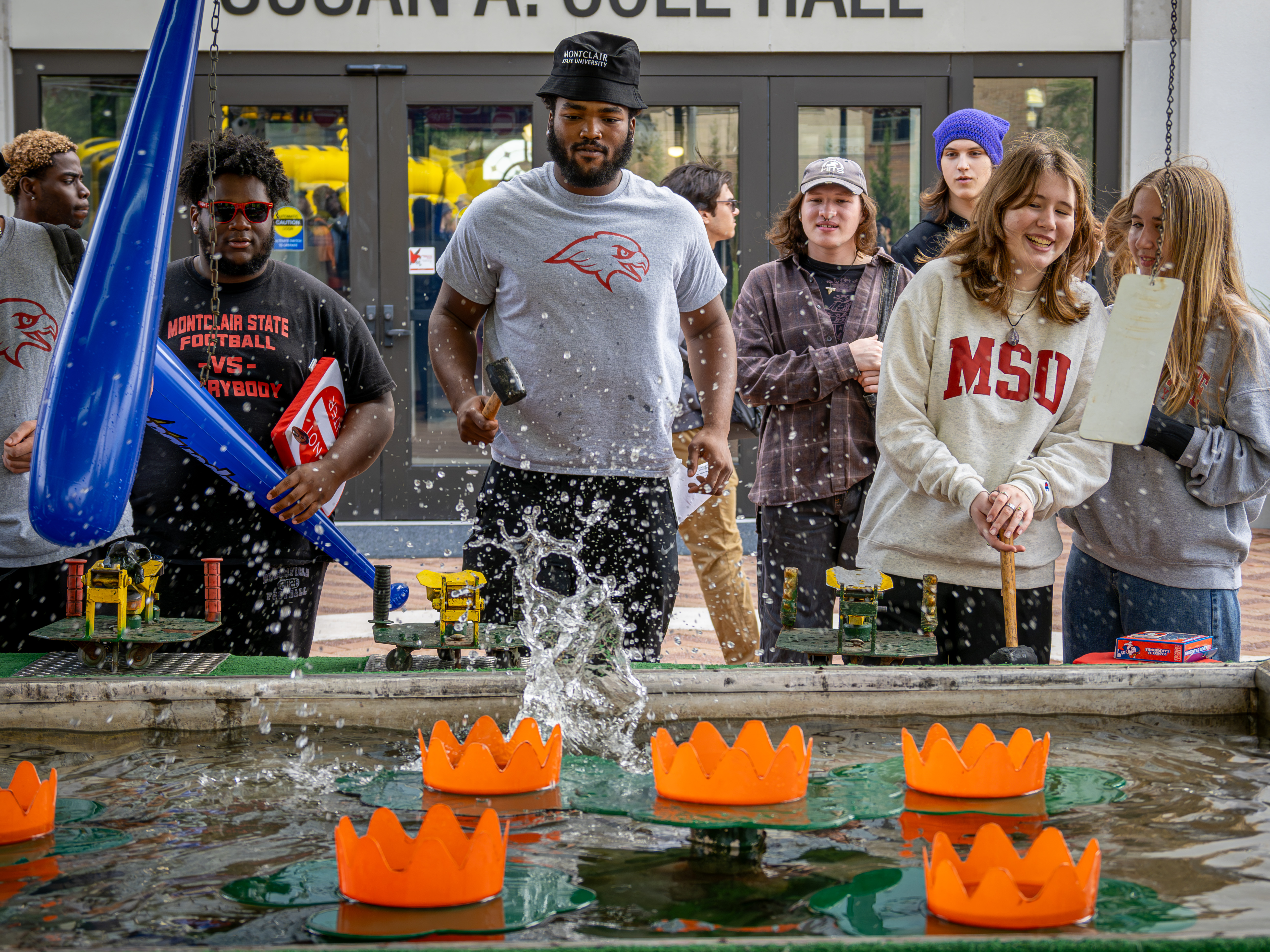 Man playing carnival game