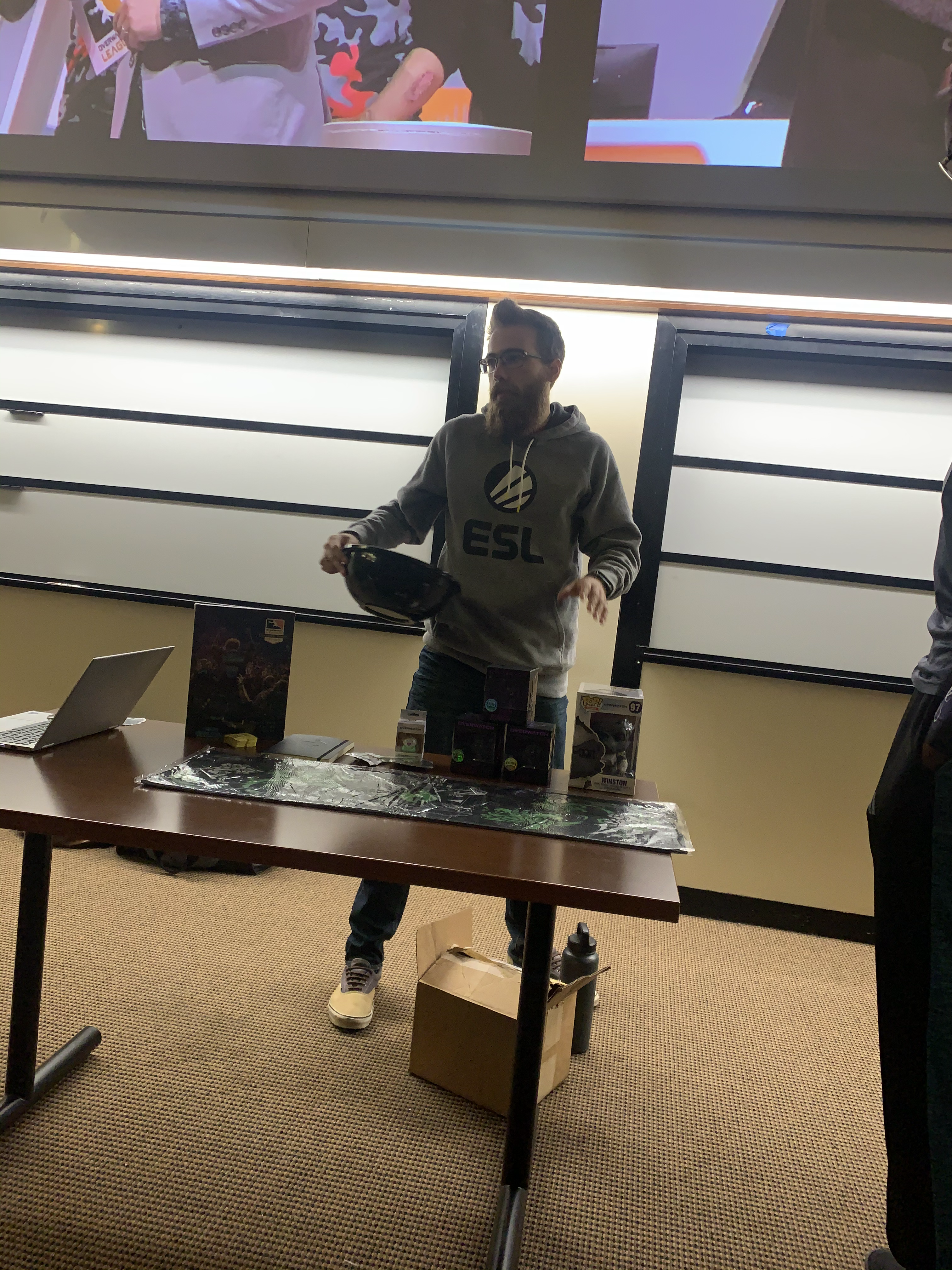 President of MSUEA explaining the prize system before picking raffle tickets