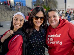photo of Omayma Jabara, Nicole Fleming, and Julia DelBagno smiling