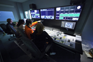 Photo of Montclair State students in studio control room.