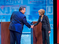 Christie and Buono shake hands before debate.