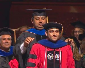 Pralhad Burli being hooded at the Graduate Commencement