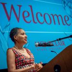 Rita Walters at podium.