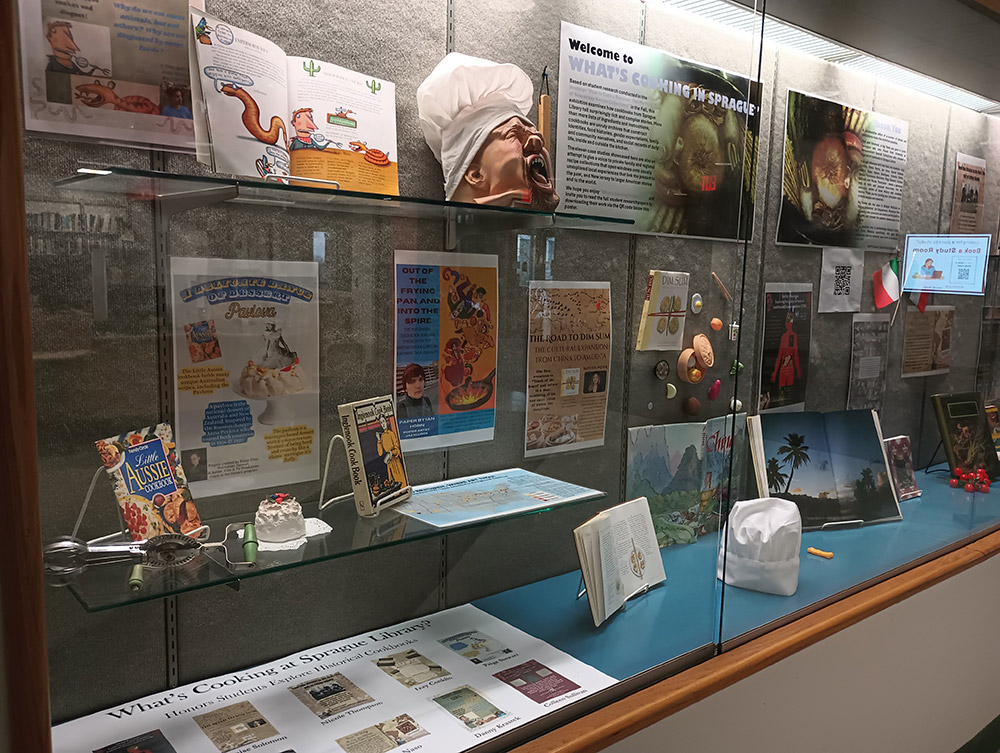 cookbook display with various cookbook related artifacts