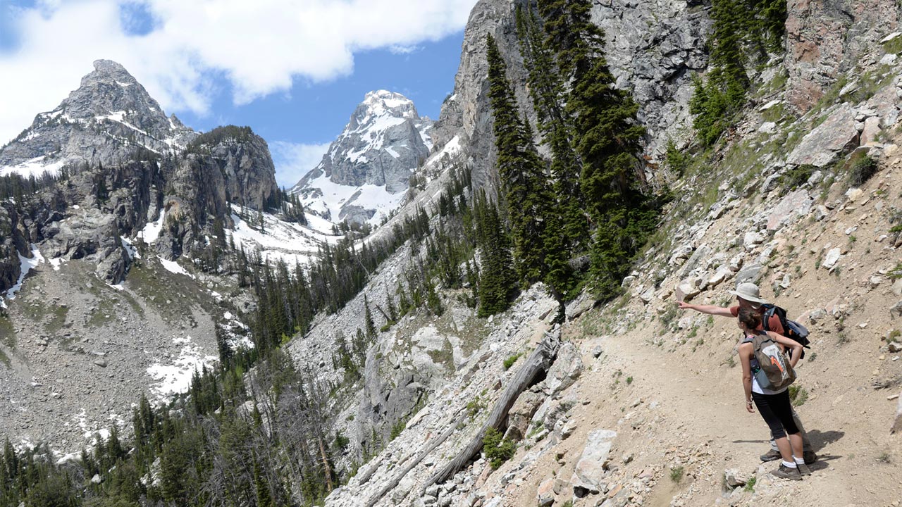 Photo of Masha Guzner and Dave Sharpe on the trail in Grand Teton National Park in Wyoming
