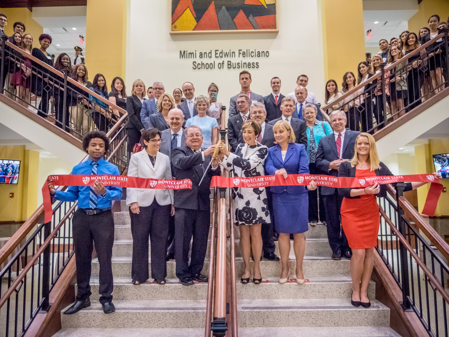 Ribbon-cutting ceremony for the Feliciano School of Business.