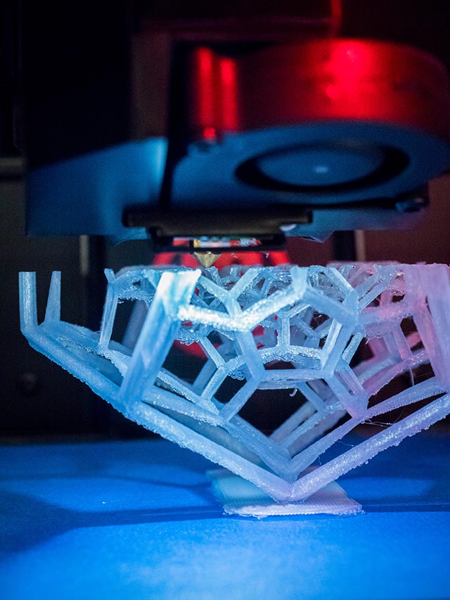 A 3D printer in action.