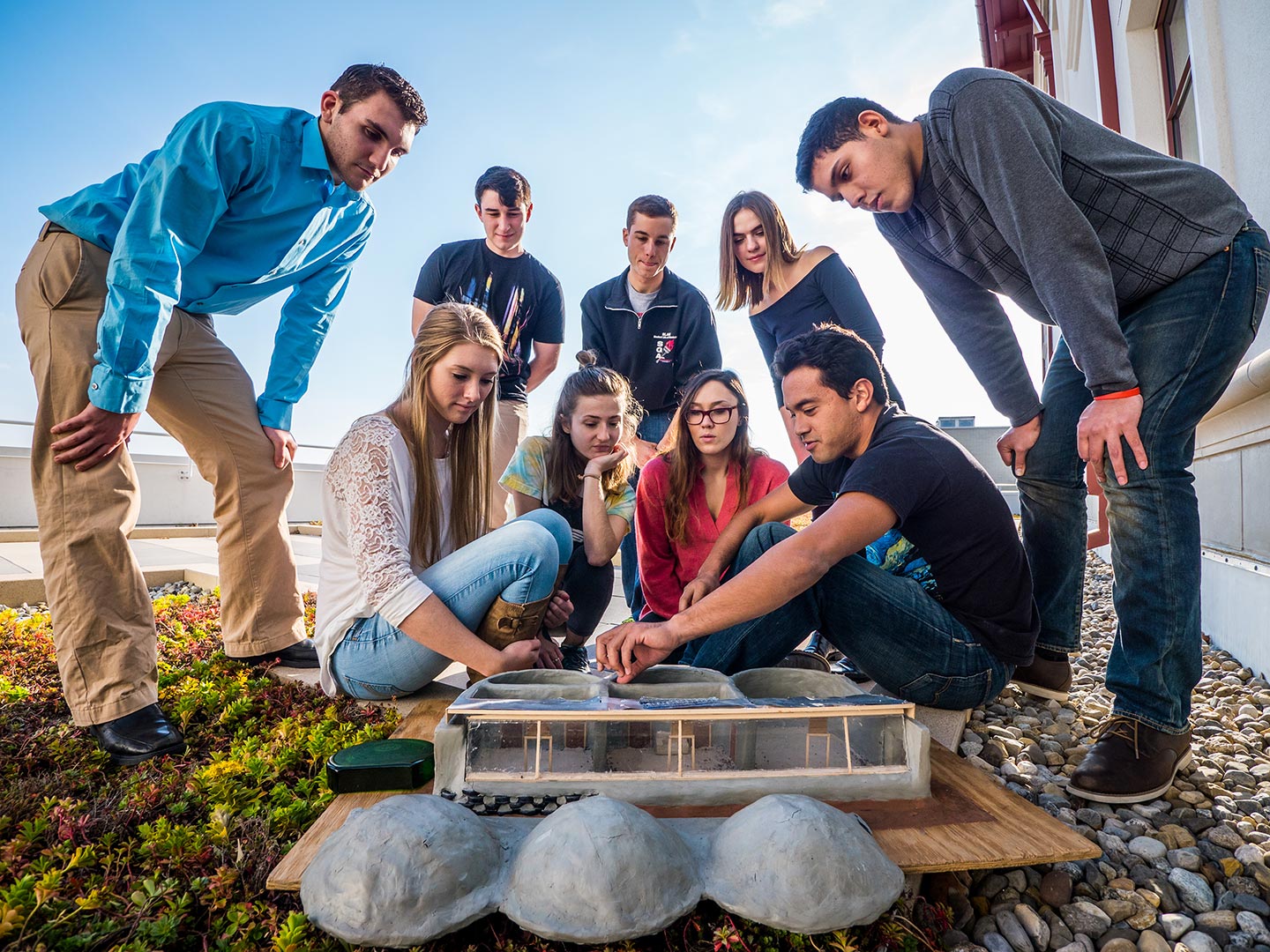 Montclair State University's Environmental Club building an Earthship.