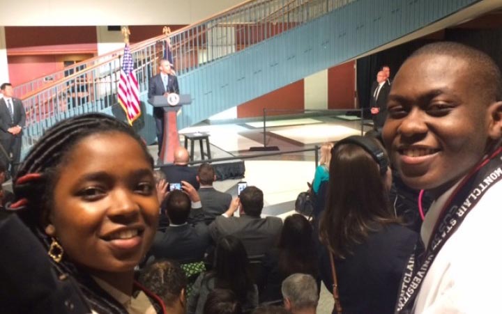A couple of Montclair State University students taking a selfie at Obama's Speech in Newark.