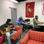 Student Veterans sit in lounge