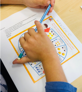 Image of Child working on Italian Project