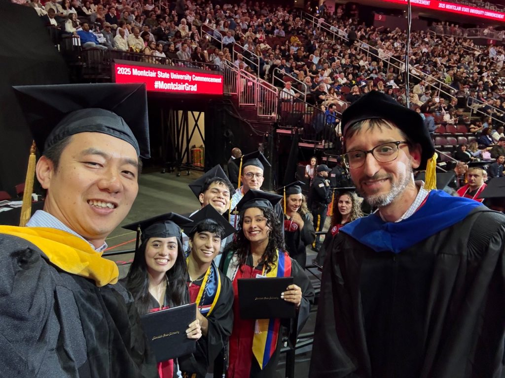 Physics faculty and graduates at 2025 Commencement.