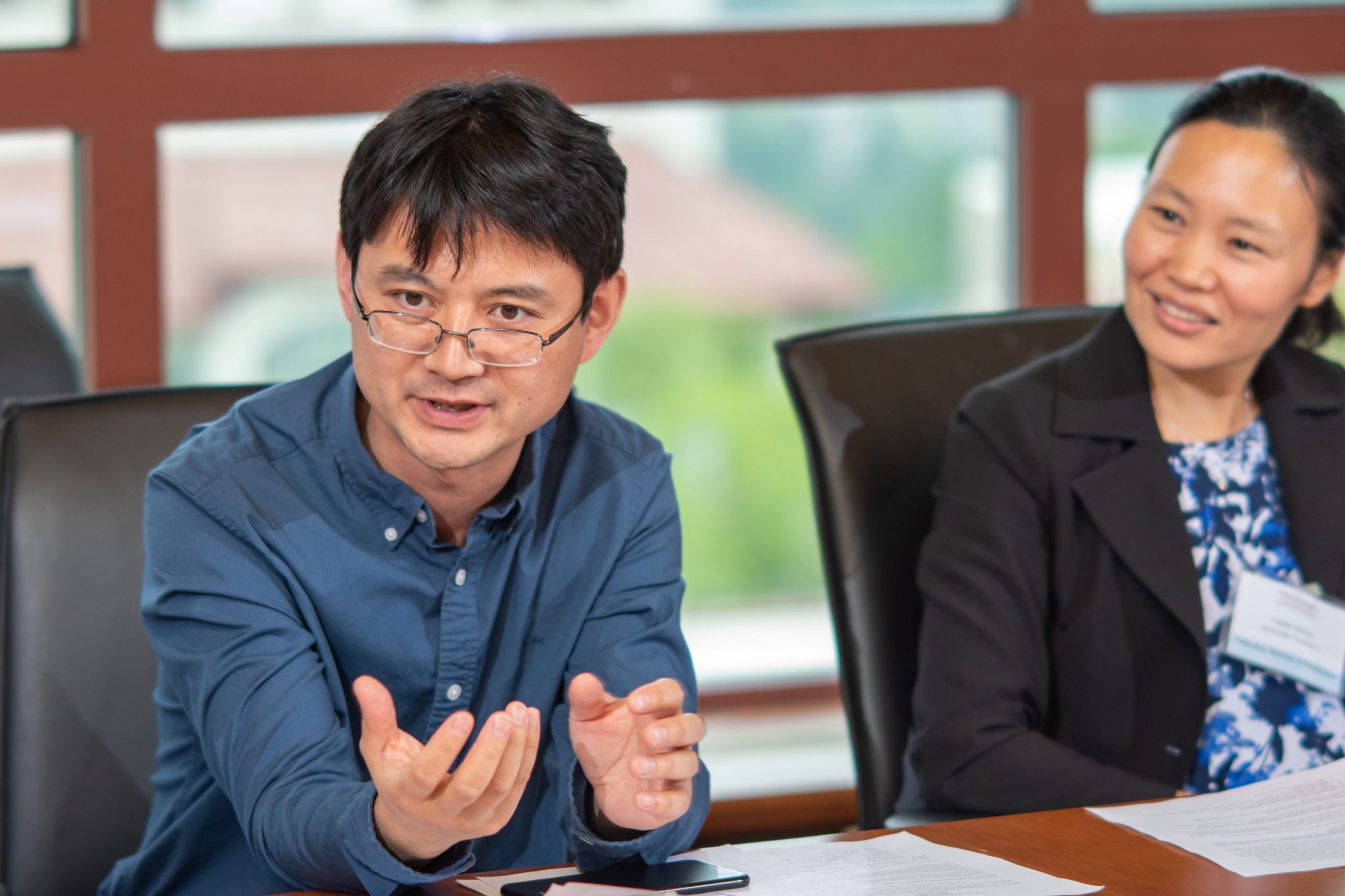 faculty discussion in board meeting