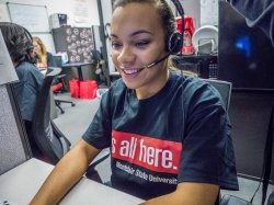 A student working in the Call Center for Annual Giving.