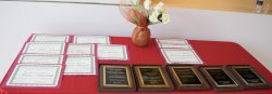awards and plaques on table