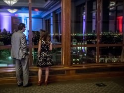 Two guests taking in the magnificent views of New York City from the Conference Center Ballroom.