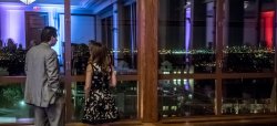 Two guests admiring the view from the Main Ballroom in the Conference Center.