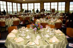 2006 Annual Dinner in the University Hall conference center. Some tables set up with place-cards and settings.