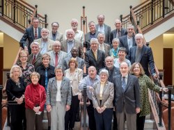 Emeriti Faculty on staircase in April 2018