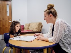 Psychologist speaking with small child