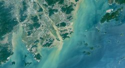 Satellite photo of coastal town