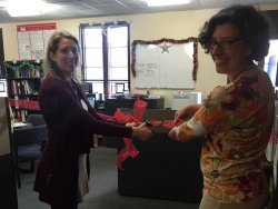 Jen Urban and Miriam Linver cutting the ribbon to the new REDSS Lab!