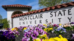 Exterior shot of main entrance and Montclair State sign.