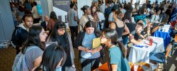 Image of students at a job fair on campus.