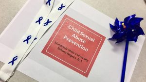 Image of a presentation slide that says "Child Abuse Prevention" Montclair State University Briana Rogers, B.A.