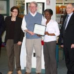 Sandra Adams and Douglas Larkin accepting award