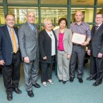 Jason Dickinson receiving award