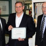 Bryan Murdock receiving award