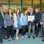 Bryan Murdock receiving award