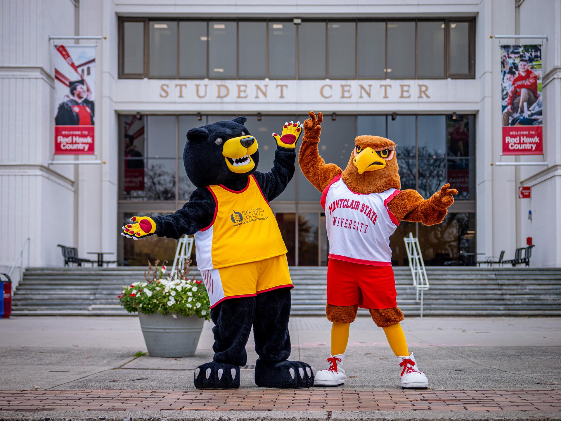 Deacon and Rocky posing in front of the MSU Student Center