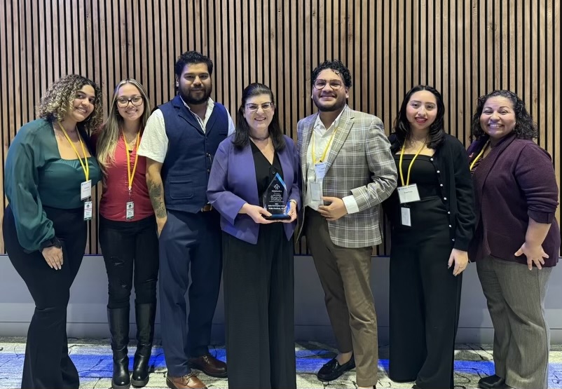 Dr.Goldfarb with Montclair staff and students.