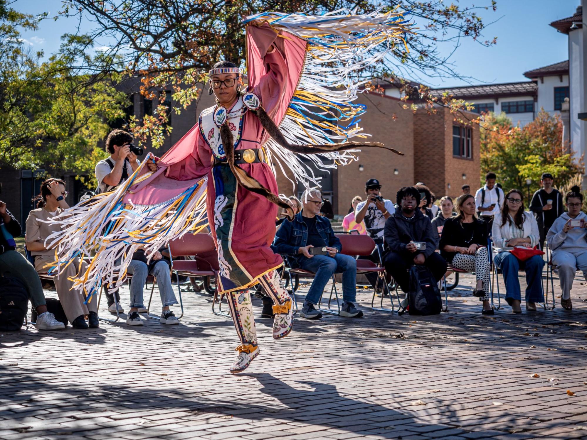 Person in traditional Native American clothing