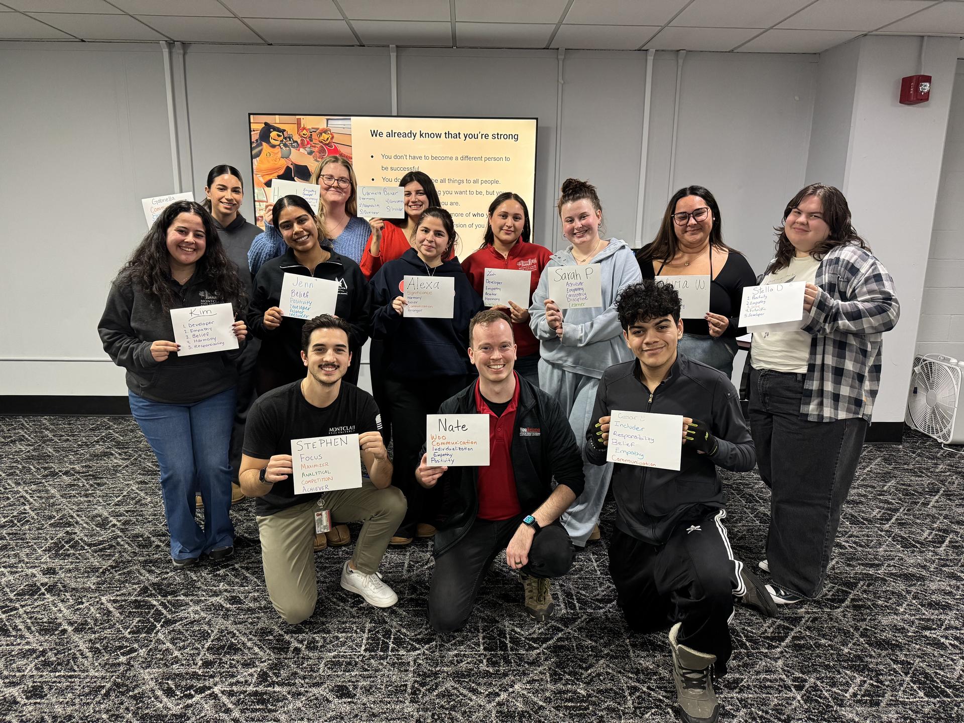 Group of people posing for a photograph.