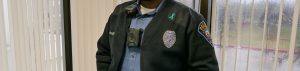 Close up of a University Police officers body camera on his uniform.