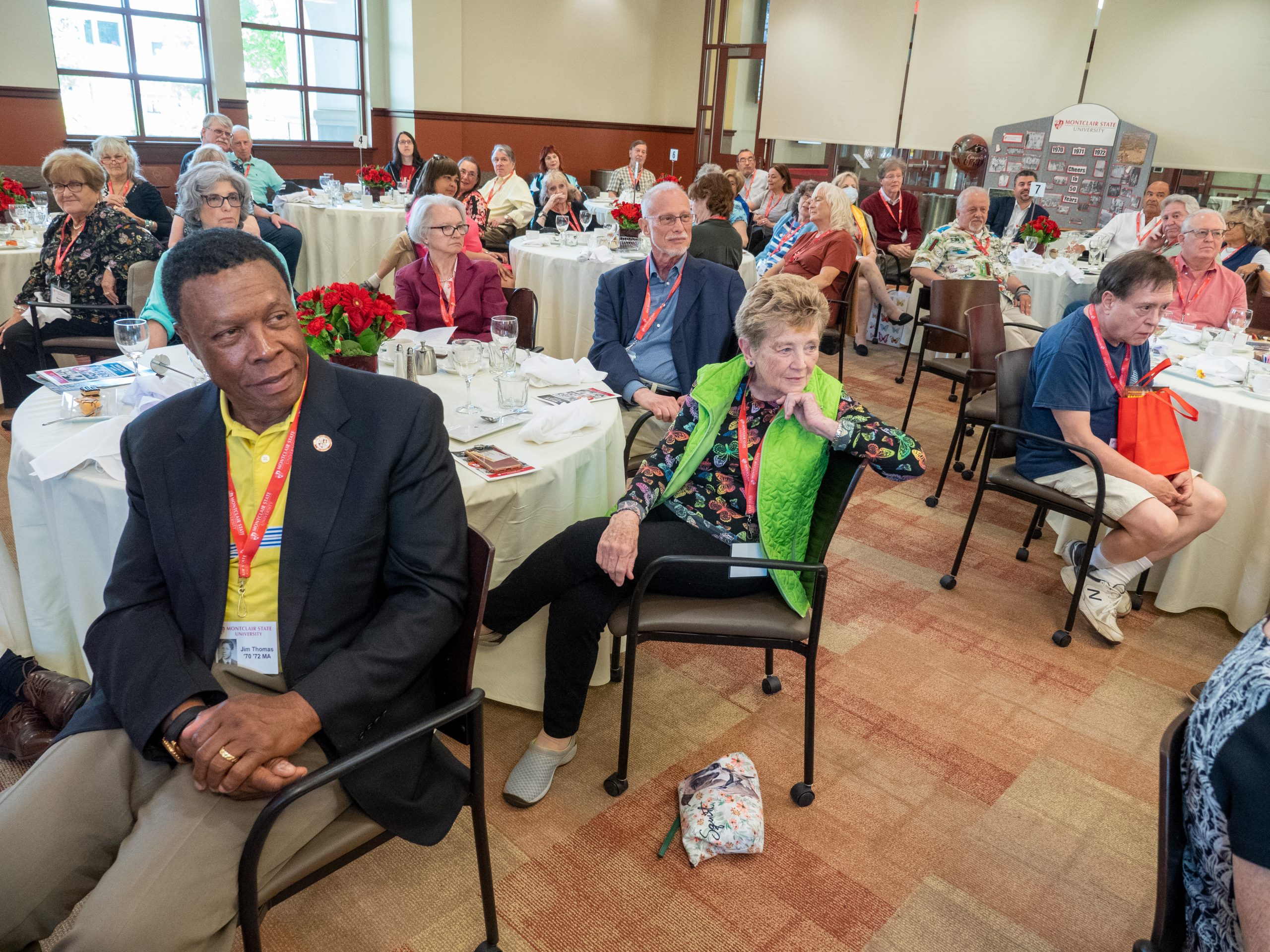 Reunion attendees seated at reception.