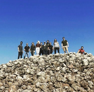 Students in Scotland studying artifacts