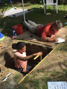 MSU archaeology students Dangelis Soto and Will Williams recording a unit profile at the Dunkerhook site.