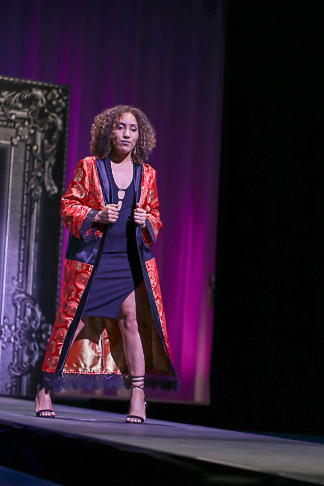 woman in brocade coat