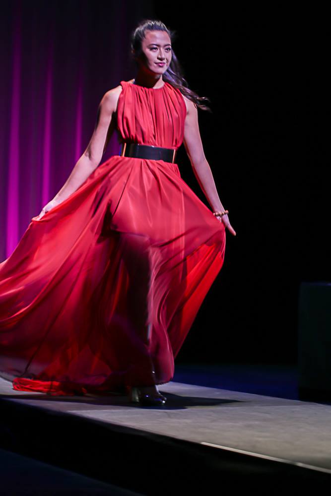 woman in red dress walking