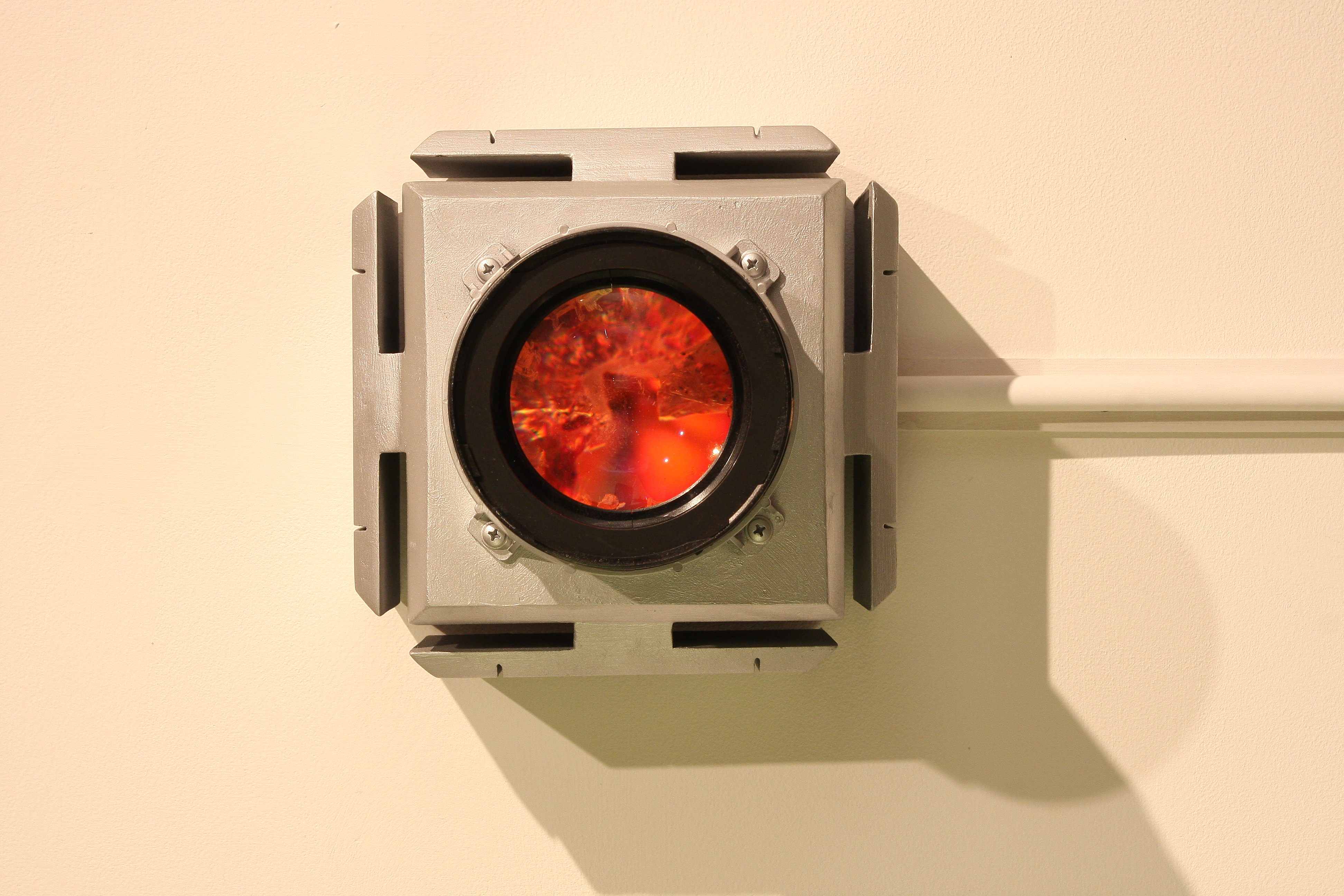 Detail of the piece "Detail of Portal" mixed media and lightbox with lens dimensions variable, 2015. By Gianluca Bianchino MFA '11, exhibiting work in "Through the Lens" at the Hunterdon Art Museum.