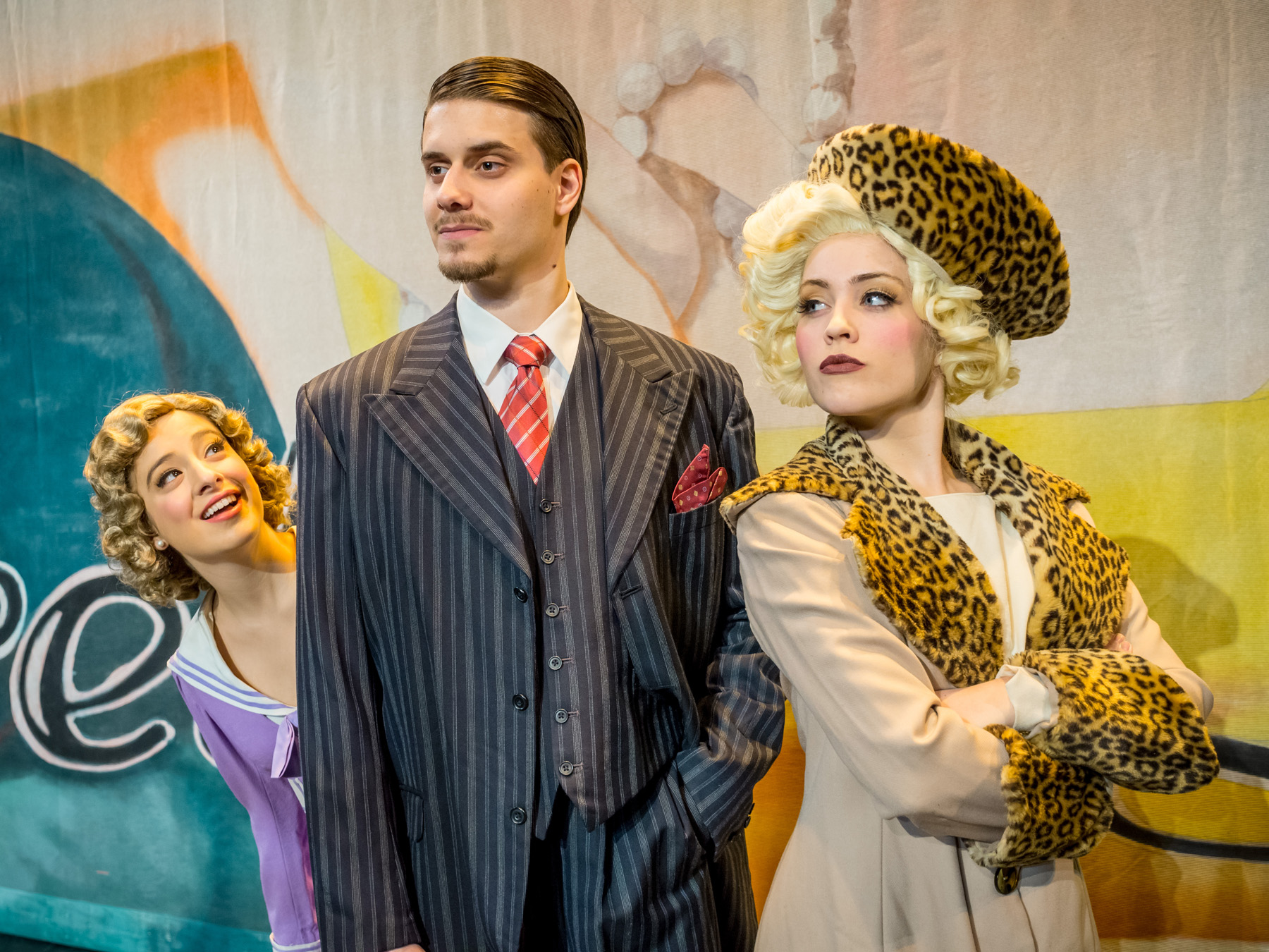 Three actors pose for photo