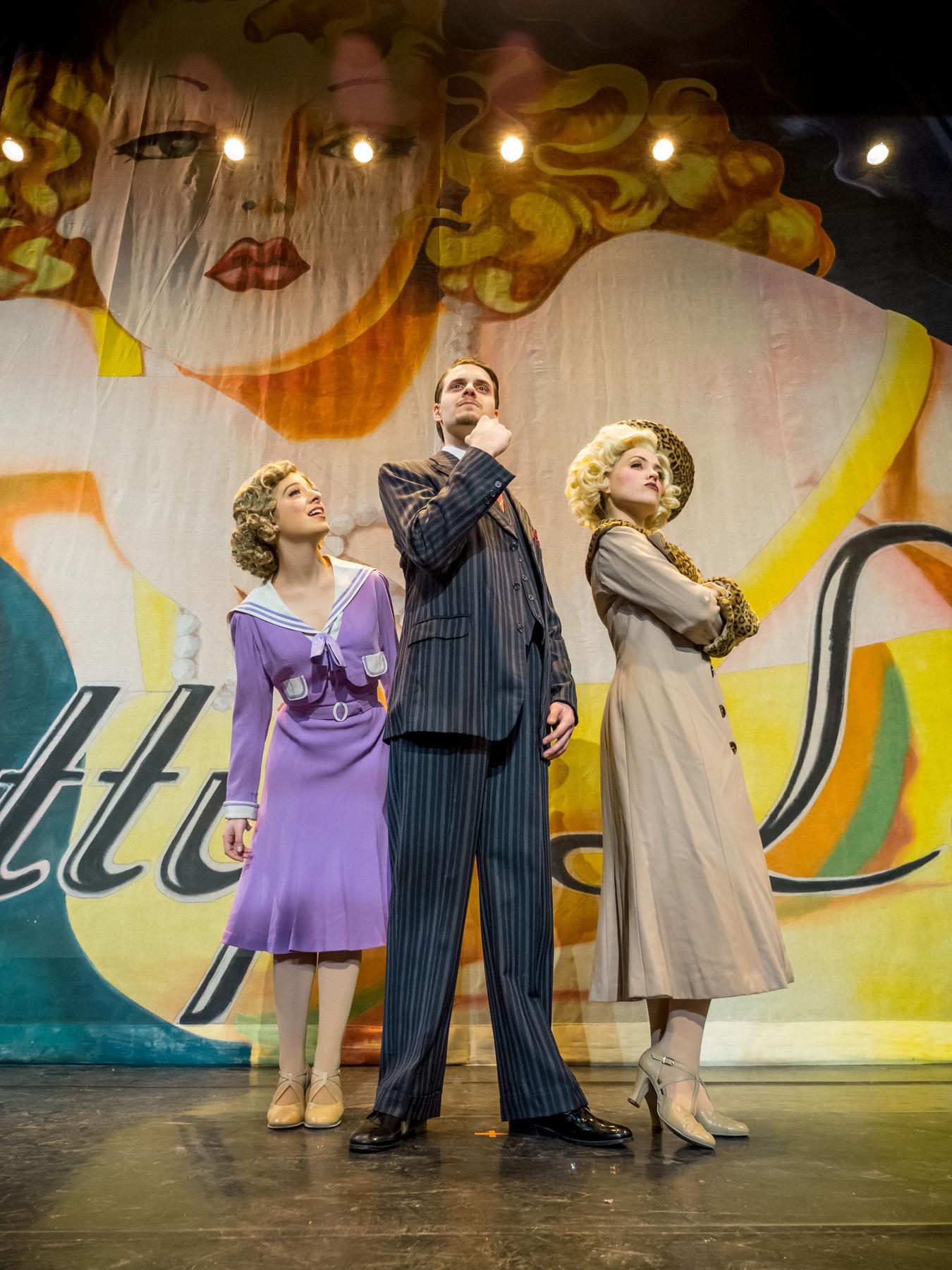 Three actors pose for photo