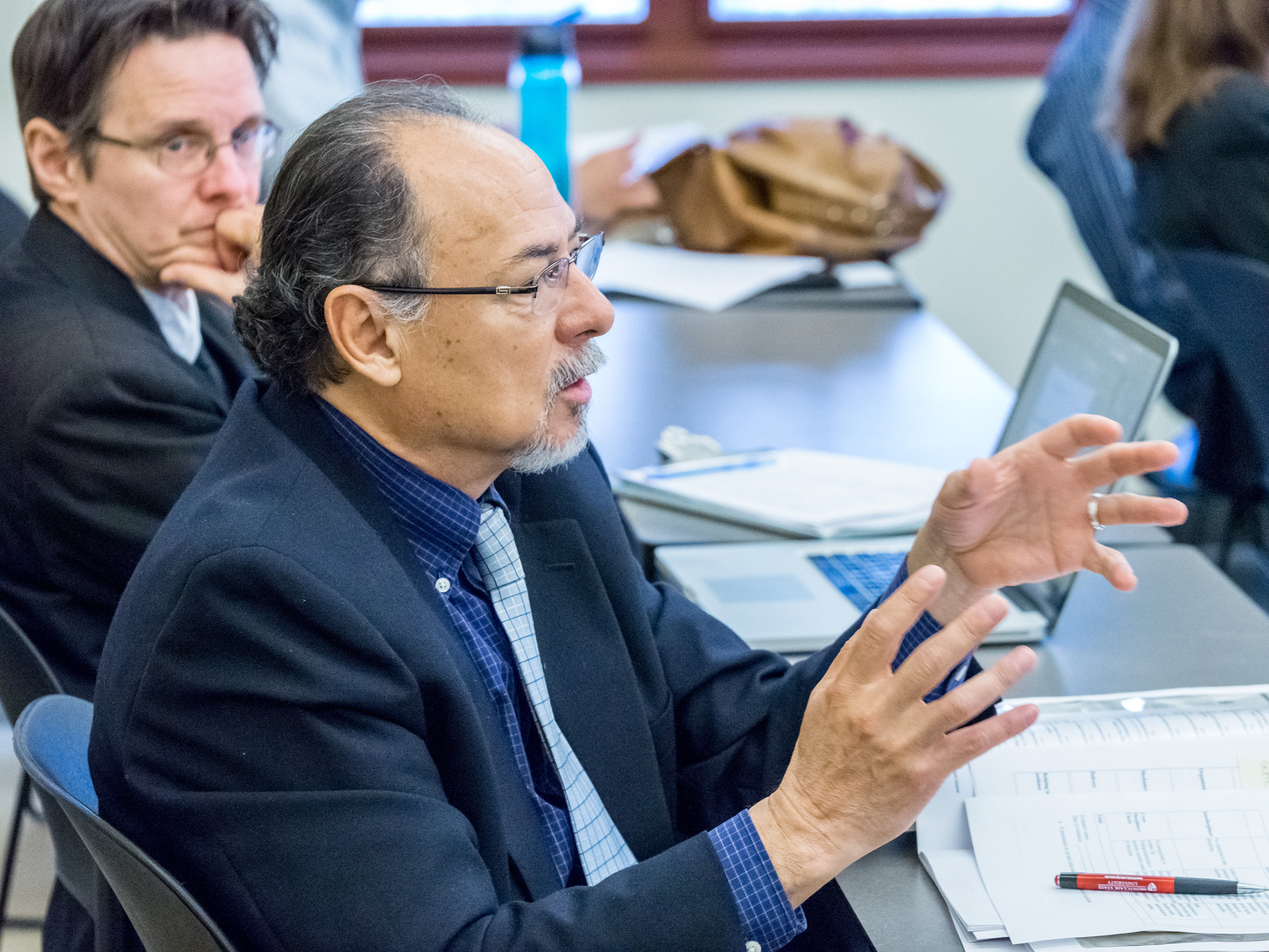 College of Humanities and Social Sciences Associate Dean Luis Montesinos asks a question.