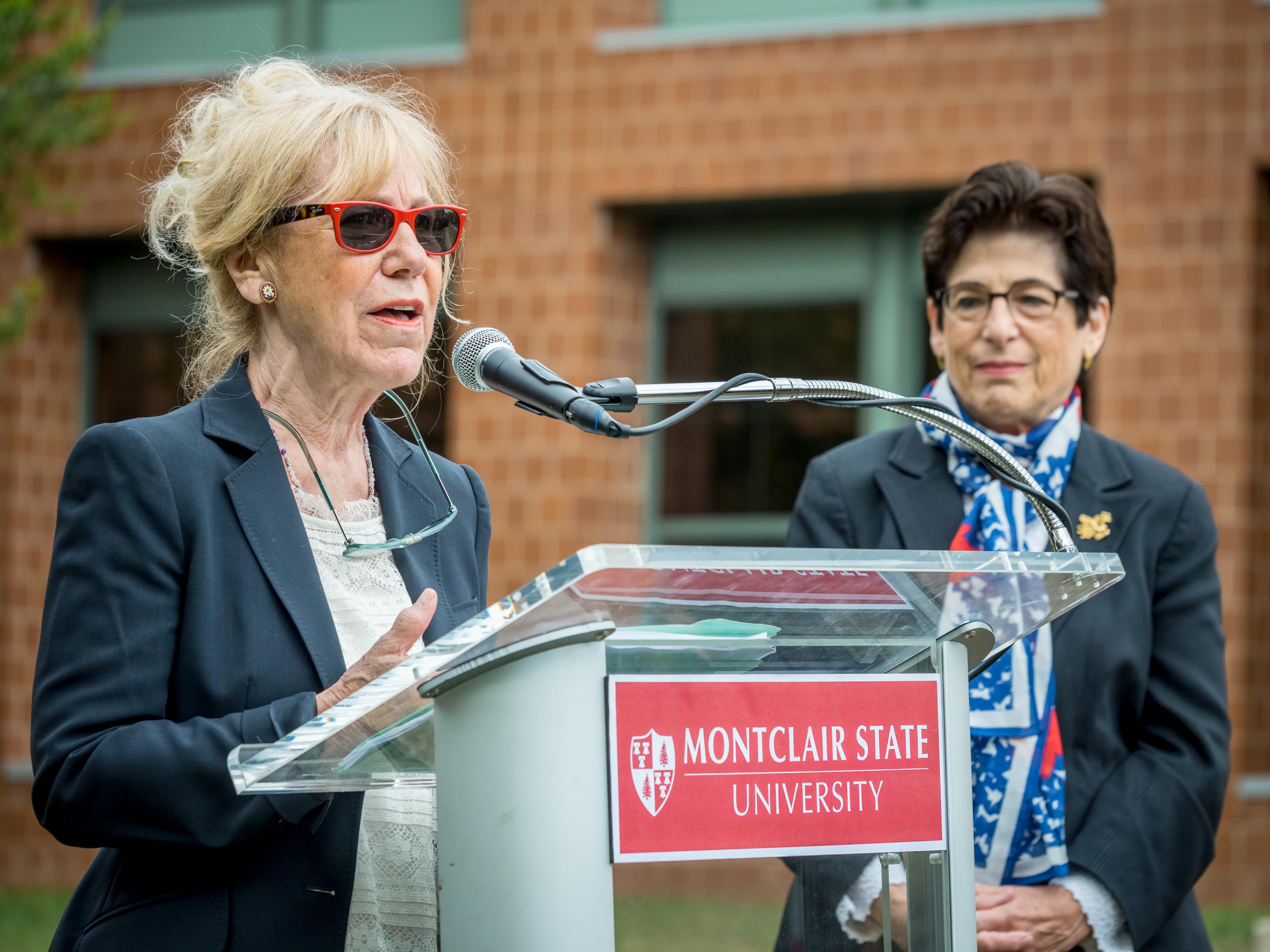 Artist Carol Brown Goldberg and Montclair State University President Susan Cole.