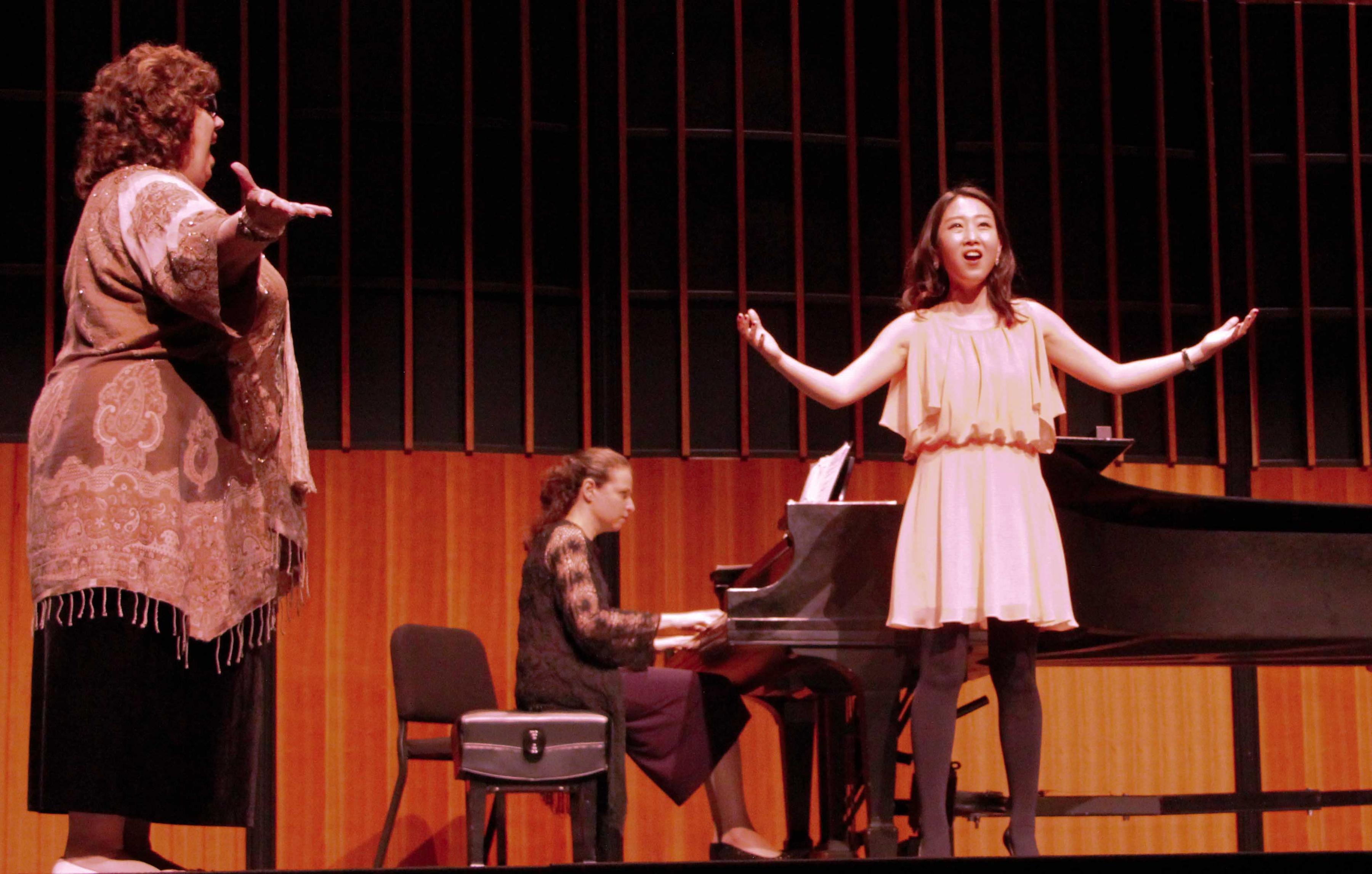 Cali School of Music Faculty Member Barbara Dever working with Artist Diploma student Sujin (Victoria) Kang in a masterclass, at the 2016 NATS Eastern Region Conference.