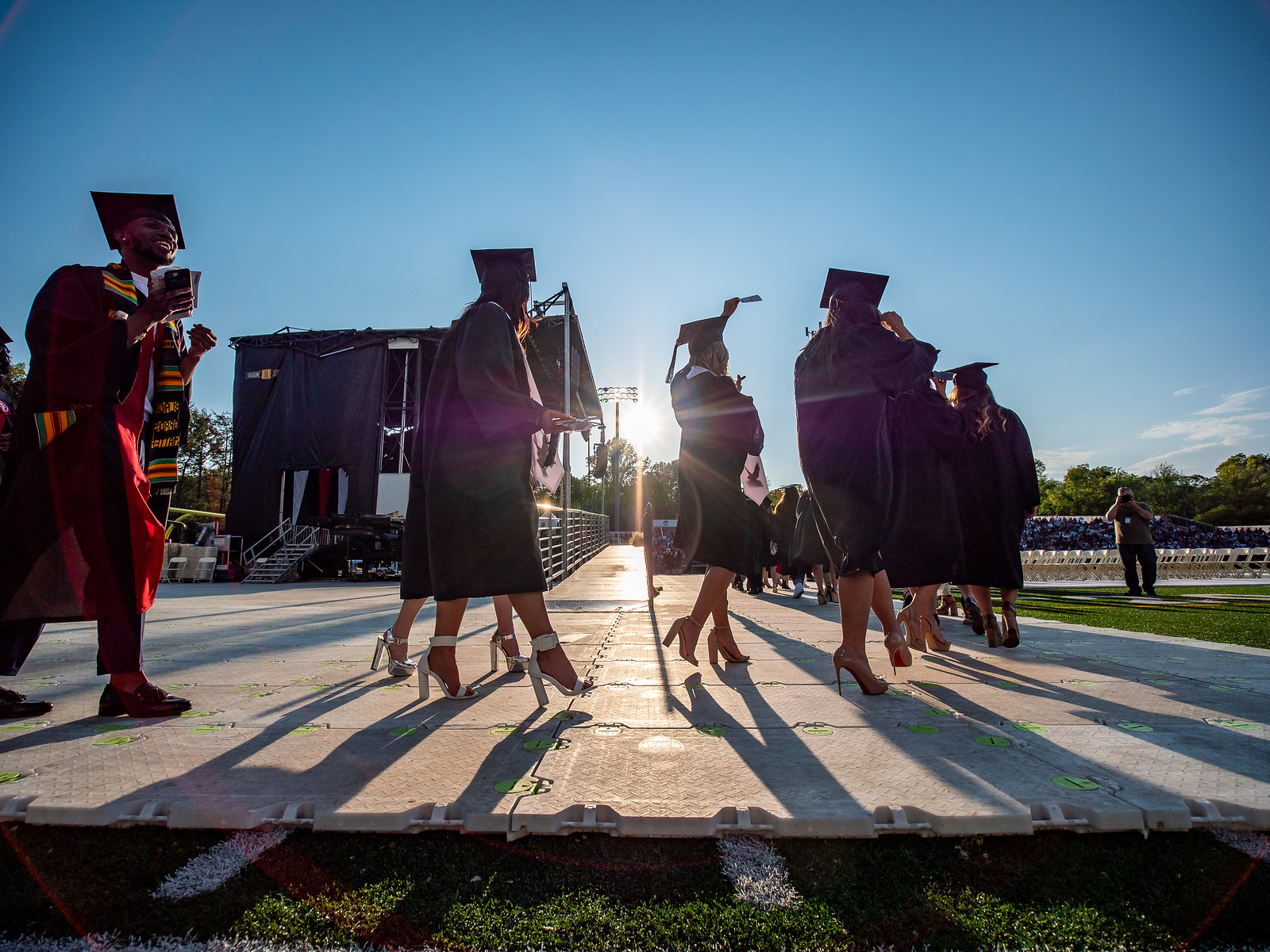student walking on stage